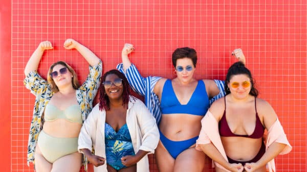 Group of plus size women with swimwear at the beach